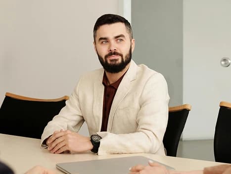 Professional in light blazer